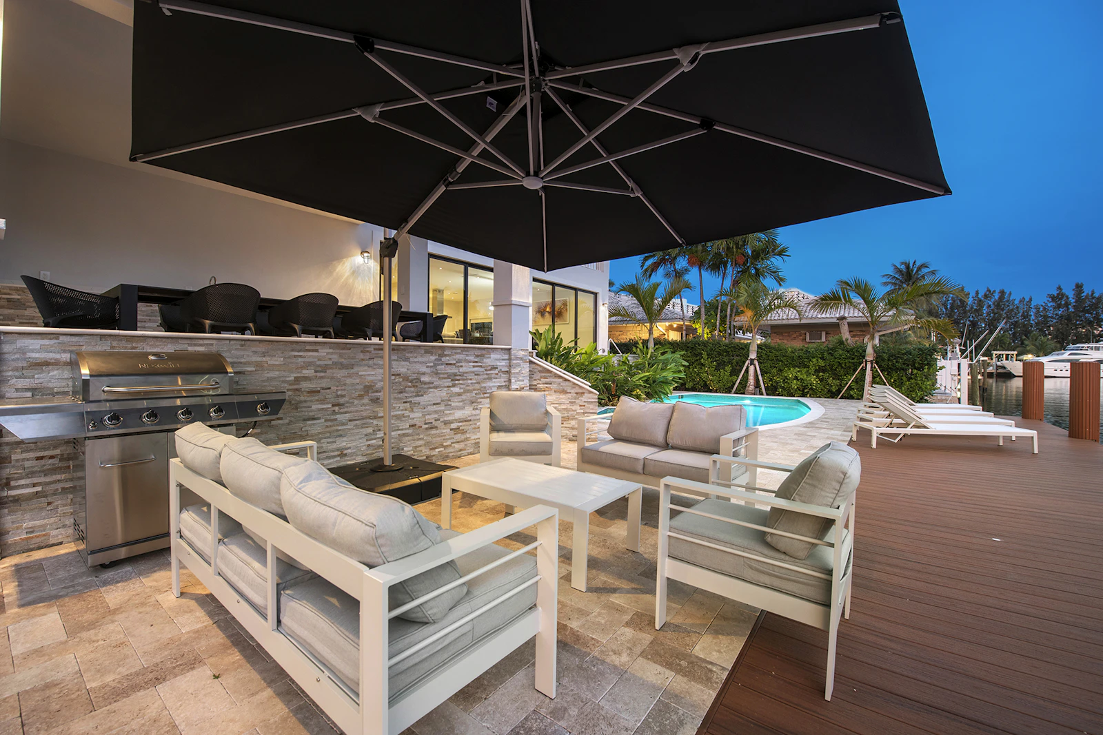 Backyard Pool with Outdoor Kitchen and Dining