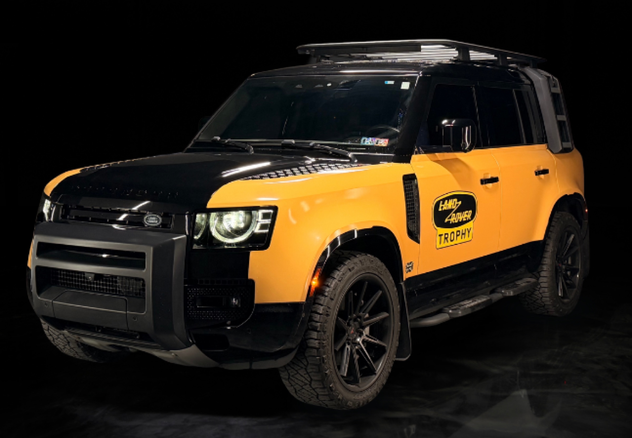 Yellow Land Rover Defender Trophy rental in Miami