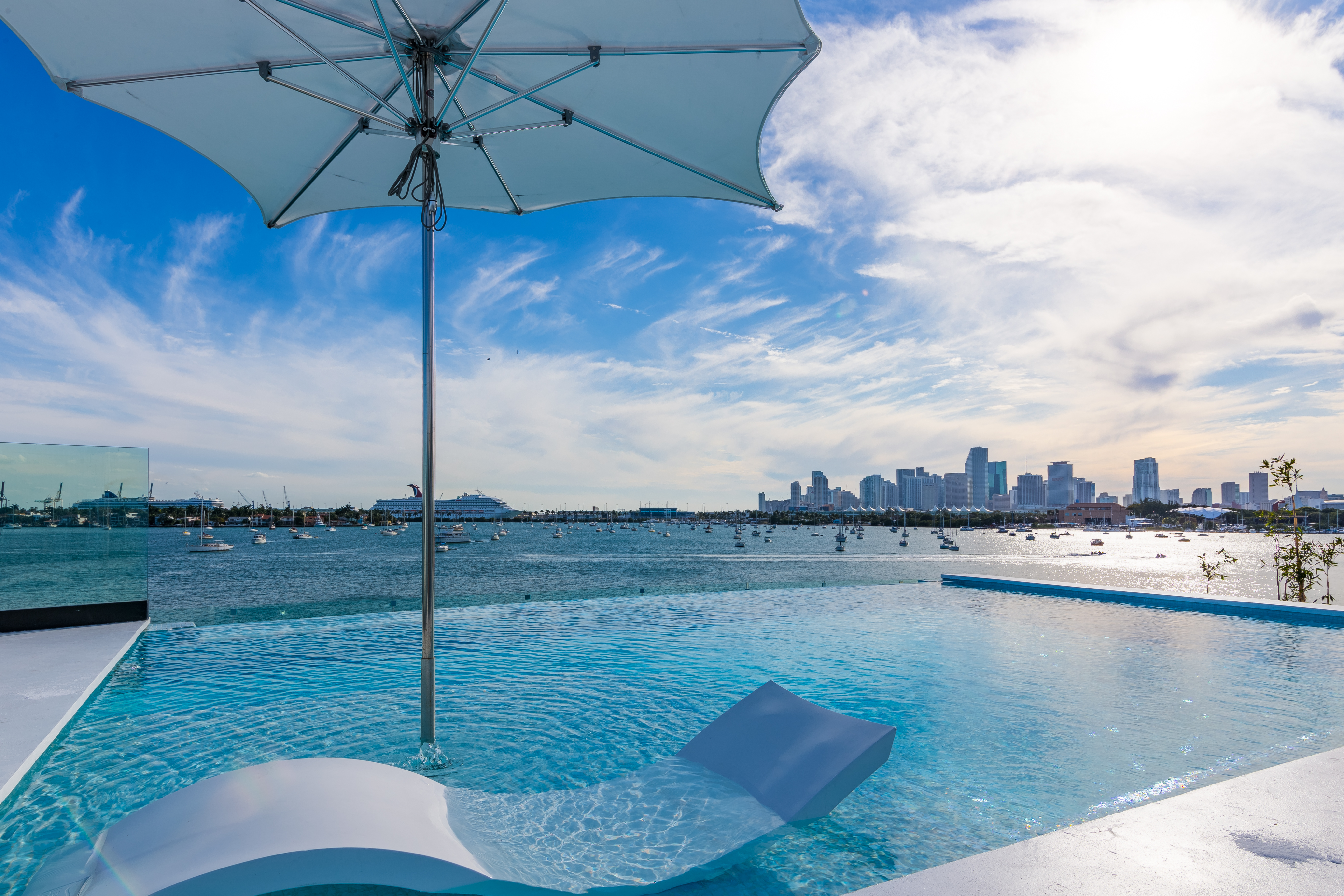 Rooftop infinity pool at Villa Savant, Miami Beach, overlooking Biscayne Bay